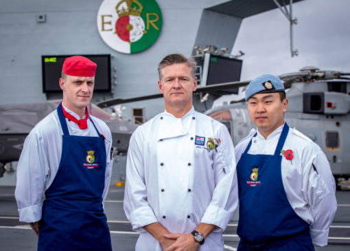 RLC chef LCpl Scott is working onboard HMS QUEEN ELIZABETH alongside Royal Naval chefs