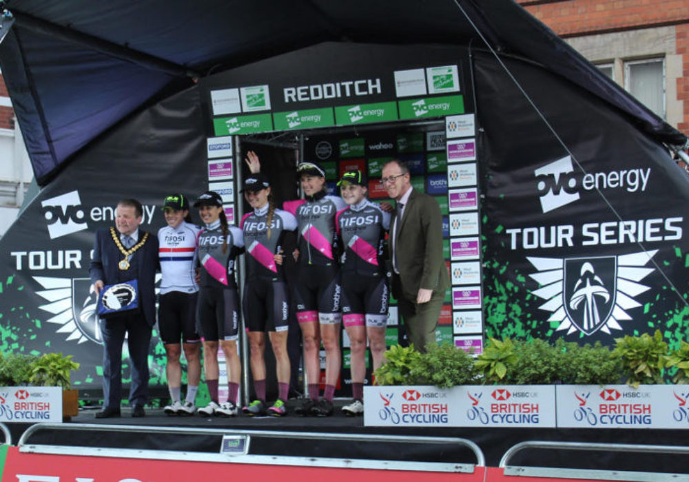 LCpl Charmaine Porter (centre) toasting the win with the team at Redditch