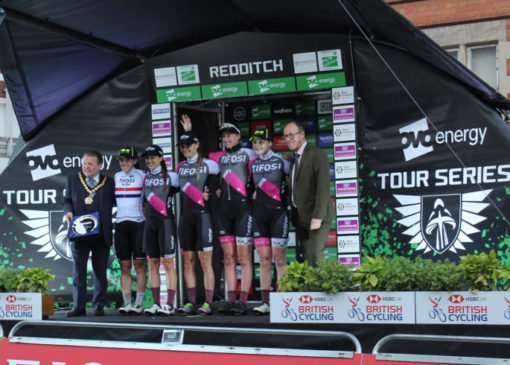 LCpl Charmaine Porter (centre) toasting the win with the team at Redditch